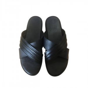 Black crossed slippers