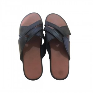 Black and brown crossed slippers